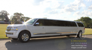 14 passenger limo Lincoln Navigator with sun glare