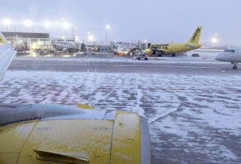 Spirit airlines plane at the OHare airport terminal