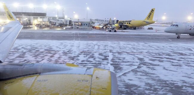 Spirit airlines plane at the OHare airport terminal
